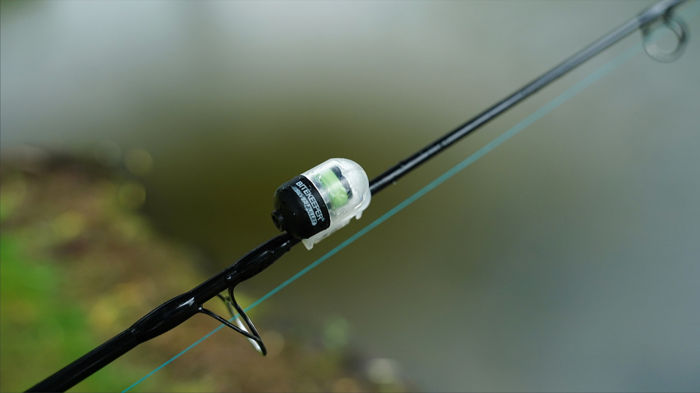 Lightweight fishing bite indicator bobbin with a sleek design for carp anglers.