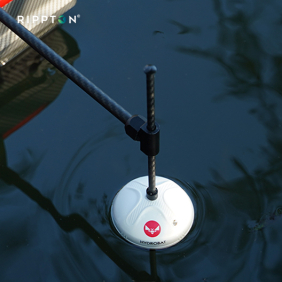 Hydrobat floating on water surface, showcasing its waterproof design. bait boat fish finder. right fish finder brands